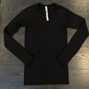 Lululemon swiftly tech black size 4